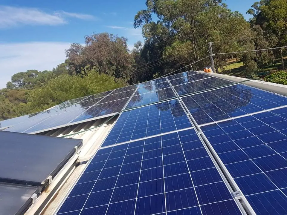 The same solar array spotless after a pure water clean